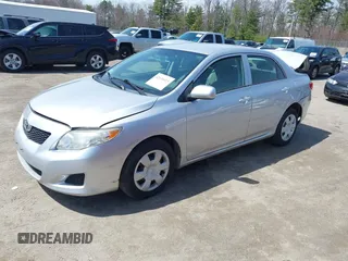 2010 Toyota Corolla with VIN 2T1BU4EEXAC298637, listed as a IAAI auction lot 42036415 with 103,885 mi miles. Bid and sale history available at carsss.com. Image 2.