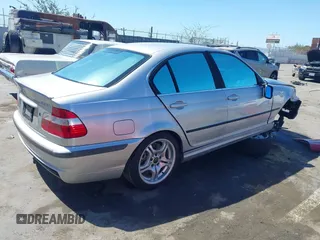 2002 BMW 3 Series 330i with VIN WBAEV53482KM22427, listed as a IAAI auction lot 41867713 with 205,653 mi miles and . Bid and sale history available at DreamBid. Image 4.