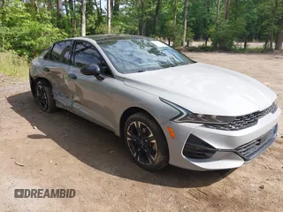 2023 Kia K5 GT-Line z VIN 5XXG64J20PG186197, wystawiony jako IAAI lot #42216925 z przebiegiem 31 577 mil mil oraz . Historia ofert i sprzedaży dostępna na DreamBid. Obrazek 1.