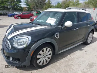 2019 MINI Countryman Cooper S z VIN WMZYT3C53K3E97116, wystawiony jako IAAI lot #42059638 z przebiegiem 72 951 mil mil oraz . Historia ofert i sprzedaży dostępna na DreamBid. Obrazek 2.