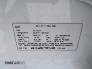2023 Tesla Model Y Performance with VIN 7SAYGDEF2PF754938, listed as a IAAI auction lot 42067041 with 21,103 mi miles and . Bid and sale history available at DreamBid. Image 9.