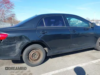 2010 Toyota Corolla with VIN 2T1BU4EE0AC291034, listed as a IAAI auction lot 42059810 with 132,363 mi miles. Bid and sale history available at carsss.com. Image 12.
