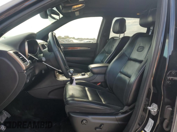 2015 Jeep Grand Cherokee Overland with VIN 1C4RJFCG6FC919637, listed as a Copart auction lot 52072925 with 111,552 mi miles and Salvage Title. Bid and sale history available at carsss.com. Image 7.