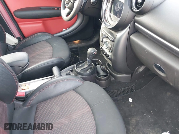 2015 MINI Cooper Countryman S with VIN WMWZC5C51FWP49282, listed as a IAAI auction lot 40698179 with 63,037 mi miles. Bid and sale history available at carsss.com. Image 5.