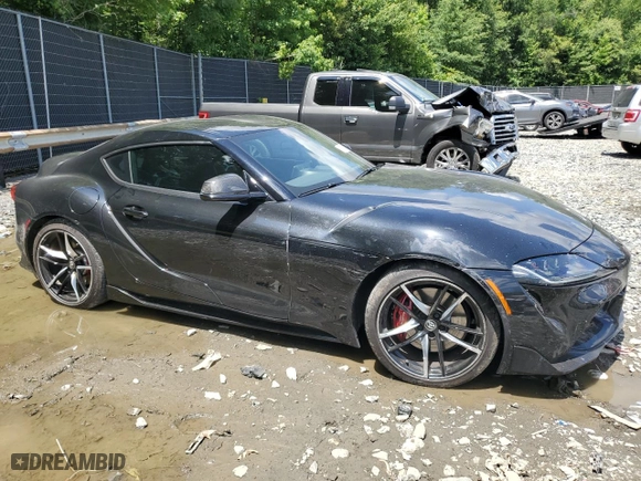 2021 Toyota GR Supra 3.0 with VIN WZ1DB0C04MW035703, listed as a Copart auction lot 61306374 with 46,176 mi miles and Salvage Title. Bid and sale history available at carsss.com. Image 4.