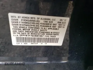 2012 Honda Ridgeline Sport z VIN 5FPYK1F76CB001867, wystawiony jako Copart lot #57944775 z przebiegiem 92 900 mil mil oraz Szkoda całkowita • Salvage title. Historia ofert i sprzedaży dostępna na DreamBid. Obrazek 13.