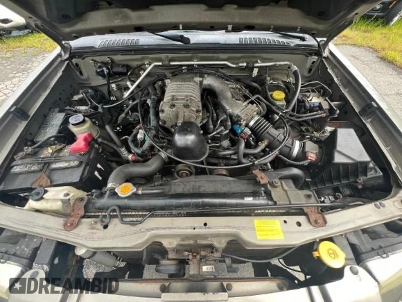 2004 Nissan Frontier SC z VIN 1N6MD29Y24C441110, wystawiony jako Copart lot #75842344 z przebiegiem 119 954 mil mil oraz Czysty tytuł • Clean title. Historia ofert i sprzedaży dostępna na DreamBid. Obrazek 7.