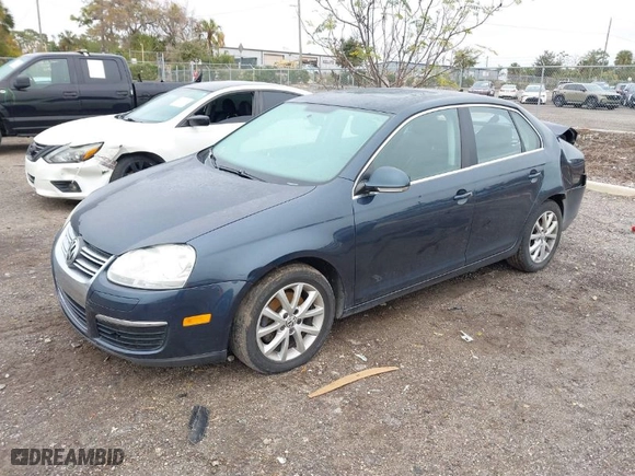 2010 Volkswagen Jetta Sedan Limited with VIN 3VWRX7AJ0AM009019, listed as a IAAI auction lot 41413050 with 164,752 mi miles. Bid and sale history available at carsss.com. Image 2.