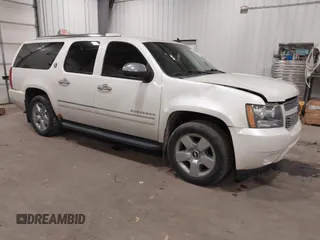 2010 Chevrolet Suburban LTZ with VIN 1GNUKKE31AR290571, listed as a IAAI auction lot 40948006 with 163,758 mi miles. Bid and sale history available at carsss.com. Image 1.