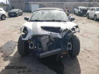 2012 MINI Roadster S z VIN WMWSY3C57CT144767, wystawiony jako Copart lot #76274884 z przebiegiem 44 896 mil mil oraz Tytuł czysty. Historia ofert i sprzedaży dostępna na DreamBid. Obrazek 5.