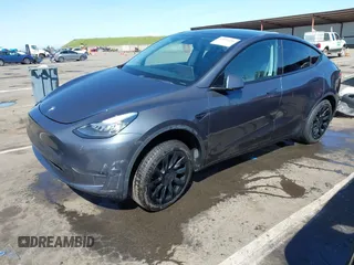 2020 Tesla Model Y Long Range with VIN 5YJYGDEF8LF000658, listed as a IAAI auction lot 41669246 with 44,281 mi miles and . Bid and sale history available at DreamBid. Image 2.