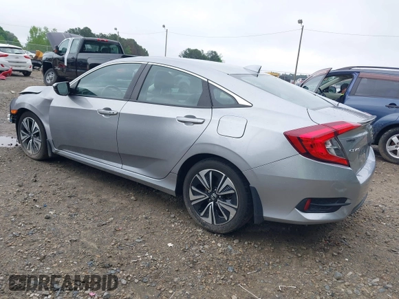 2017 Honda Civic EX-L z VIN 19XFC1F77HE026030, wystawiony jako IAAI lot #42112898 z przebiegiem 73 793 mil mil oraz . Historia ofert i sprzedaży dostępna na DreamBid. Obrazek 3.