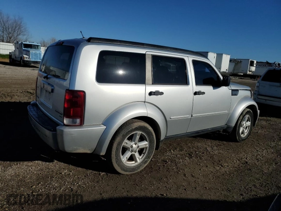 2010 Dodge Nitro SXT z VIN 1D4PT5GK5AW106990, wystawiony jako Copart lot #88719415 z przebiegiem 193 019 mil mil oraz Szkoda całkowita • Salvage title. Historia ofert i sprzedaży dostępna na DreamBid. Obrazek 3.