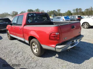 2001 Ford F-150 SuperCrew XLT with VIN 1FTRW07W91KE40272, listed as a Copart auction lot 75063324 with 218,183 mi miles and Salvage Title. Bid and sale history available at carsss.com. Image 2.