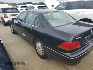 1998 Acura RL Premium with VIN JH4KA9656WC001298, listed as a Copart auction lot 73740154 with 108,066 mi miles and Salvage Title. Bid and sale history available at carsss.com. Image 2.