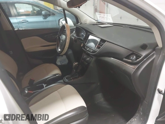 2019 Buick Encore Sport Touring with VIN KL4CJ2SB7KB780990, listed as a IAAI auction lot 41253621 with 123,157 mi miles and . Bid and sale history available at DreamBid. Image 5.