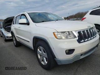 2011 Jeep Grand Cherokee Laredo with VIN 1J4RR4GG1BC669834, listed as a Copart auction lot 52923845 with 173,943 mi miles and Clean Title. Bid and sale history available at carsss.com. Image 1.