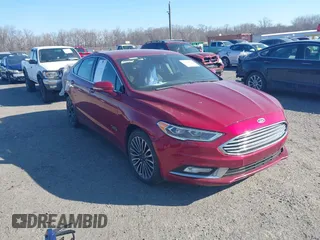 2018 Ford Fusion Energi Titanium with VIN 3FA6P0SU3JR106441, listed as a IAAI auction lot 41699936 with 146,330 mi miles. Bid and sale history available at carsss.com. Image 1.