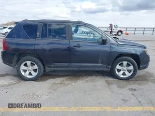 2015 Jeep Compass Sport with VIN 1C4NJDBBXFD151700, listed as a IAAI auction lot 41855482 with 124,822 mi miles. Bid and sale history available at carsss.com. Image 13.