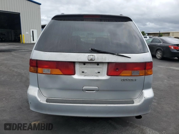 2002 Honda Odyssey EX-L with VIN 2HKRL18902H506828, listed as a Copart auction lot 53735625 with 214,446 mi miles and Salvage title. Bid and sale history available at DreamBid. Image 6.