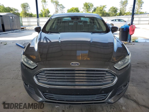 2015 Ford Fusion SE Hybrid with VIN 3FA6P0LU5FR218454, listed as a Copart auction lot 60682065 with 218,668 mi miles and Salvage title. Bid and sale history available at DreamBid. Image 5.