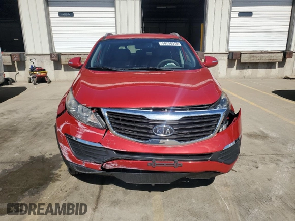 2011 Kia Sportage LX with VIN KNDPBCA27B7115456, listed as a Copart auction lot 50258315 with 142,153 mi miles and Salvage title. Bid and sale history available at DreamBid. Image 5.