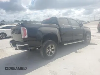 2015 GMC Canyon 2WD SLT with VIN 1GTG5CE31F1263234, listed as a Copart auction lot 76512794 with 113,180 mi miles and Salvage Title. Bid and sale history available at carsss.com. Image 3.