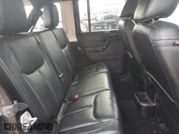 2015 Jeep Wrangler Unlimited Altitude with VIN 1C4HJWEG1FL703736, listed as a Copart auction lot 78448254 with 148,264 mi miles and Clean title. Bid and sale history available at DreamBid. Image 11.