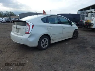 2015 Toyota Prius Four with VIN JTDKN3DU3F1986099, listed as a IAAI auction lot 41518701 with 146,291 mi miles and . Bid and sale history available at DreamBid. Image 4.