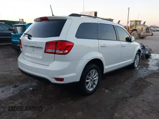 2018 Dodge Journey SXT with VIN 3C4PDCBG4JT514453, listed as a IAAI auction lot 41406727 with 121,235 mi miles. Bid and sale history available at carsss.com. Image 4.