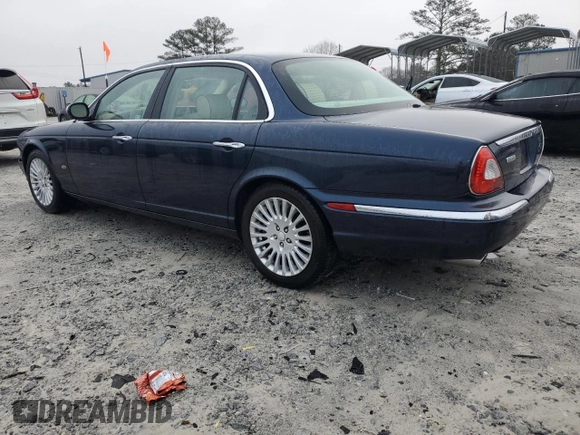 2007 Jaguar XJ Vanden Plas with VIN SAJWA82B57SH14424, listed as a Copart auction lot 45091395 with 99,242 mi miles and Salvage Title. Bid and sale history available at carsss.com. Image 2.