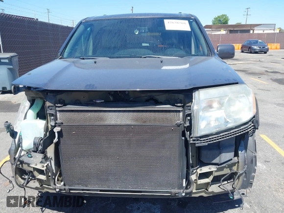 2013 Honda Pilot Touring with VIN 5FNYF3H94DB024069, listed as a IAAI auction lot 42638568 with 190,326 mi miles and . Bid and sale history available at DreamBid. Image 12.