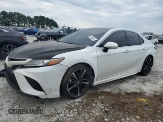 2019 Toyota Camry XSE with VIN 4T1BZ1HK3KU033091, listed as a Copart auction lot 62688935 with 132,861 mi miles and Clean title. Bid and sale history available at DreamBid. Image 1.