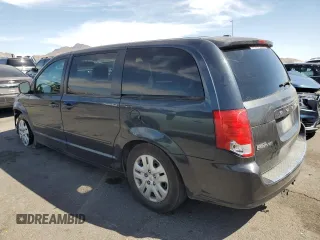 2013 Dodge Grand Caravan SE with VIN 2C4RDGBG8DR741359, listed as a Copart auction lot 52810065 with 103,735 mi miles and Salvage Title. Bid and sale history available at DreamBid. Image 2.