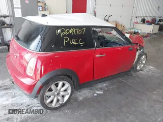 2006 MINI Hardtop S with VIN WMWRE33536TL20807, listed as a IAAI auction lot 42049707 with Not provided miles and . Bid and sale history available at DreamBid. Image 4.