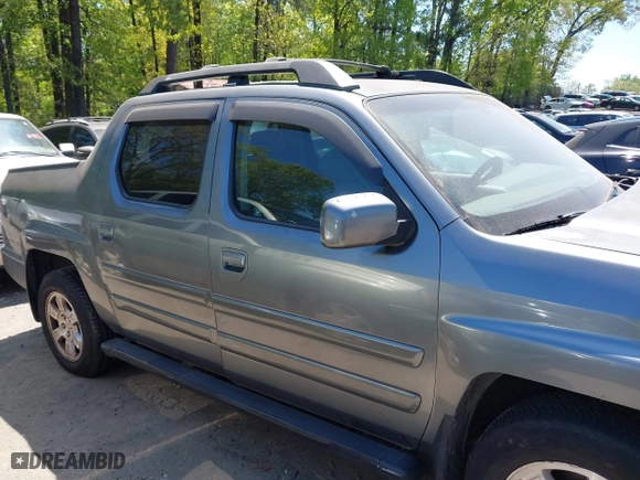 2009 Honda Ridgeline RTS with VIN 5FPYK16409B105186, listed as a IAAI auction lot 42003632 with 153,072 mi miles. Bid and sale history available at carsss.com. Image 12.