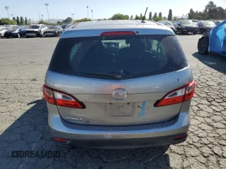2012 Mazda 5 Sport with VIN JM1CW2BL4C0107068, listed as a Copart auction lot 62880615 with 142,610 mi miles and Salvage title. Bid and sale history available at DreamBid. Image 6.