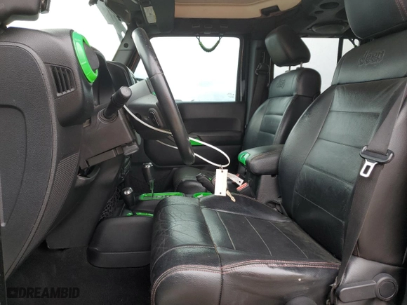 2012 Jeep Wrangler Unlimited Sahara with VIN 1C4HJWEG4CL269873, listed as a Copart auction lot 49000475 with 176,135 mi miles and Clean Title. Bid and sale history available at carsss.com. Image 7.