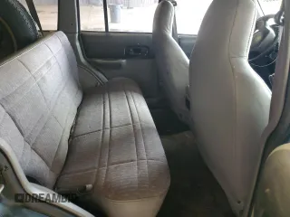 1998 Jeep Cherokee Sport with VIN 1J4FJ68S0WL152197, listed as a Copart auction lot 52512605 with Not provided miles and Salvage title. Bid and sale history available at DreamBid. Image 11.