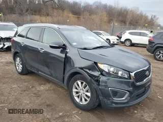 2016 Kia Sorento LX with VIN 5XYPG4A38GG103942, listed as a IAAI auction lot 41517935 with 124,396 mi miles. Bid and sale history available at carsss.com. Image 1.