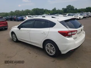 2017 Subaru Impreza Premium with VIN 4S3GTAD62H3736698, listed as a Copart auction lot 60856225 with 180,533 mi miles and Salvage title. Bid and sale history available at DreamBid. Image 2.