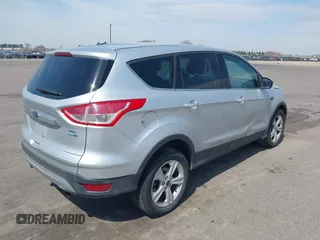 2013 Ford Escape SEL with VIN 1FMCU9H99DUA74813, listed as a IAAI auction lot 42070945 with 187,417 mi miles and . Bid and sale history available at DreamBid. Image 4.