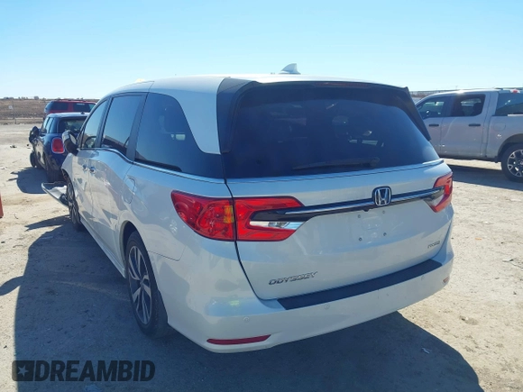 2023 Honda Odyssey Touring with VIN 5FNRL6H88PB003865, listed as a IAAI auction lot 41715384 with 40,765 mi miles and . Bid and sale history available at DreamBid. Image 3.