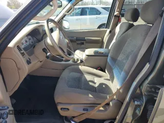 2003 Ford Explorer Sport Trac XLS with VIN 1FMZU77E43UB74698, listed as a Copart auction lot 54210645 with 207,678 mi miles and Salvage title. Bid and sale history available at DreamBid. Image 7.