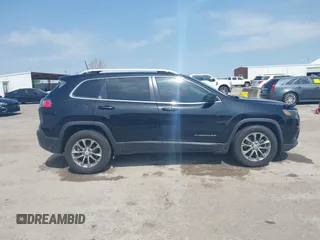 2019 Jeep Cherokee Latitude Plus with VIN 1C4PJLLB3KD377525, listed as a IAAI auction lot 41894239 with 143,711 mi miles and . Bid and sale history available at DreamBid. Image 13.