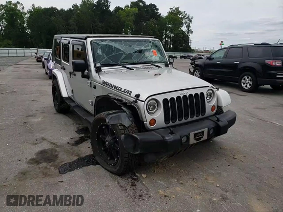 2007 Jeep Wrangler Unlimited Sahara с VIN 1J4GA591X7L158014, выставлен на аукционе Copart как лот 55201105 с пробегом 162 797 миль миль и Списание • Salvage title. История ставок и продаж доступна на DreamBid. Изображение 13.
