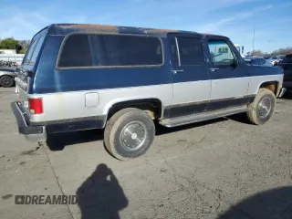 1991 Chevrolet Suburban z VIN 1GNGV26K1MF104219, wystawiony jako Copart lot #87527045 z przebiegiem 189 345 mil mil oraz Czysty tytuł • Clean title. Historia ofert i sprzedaży dostępna na DreamBid. Obrazek 3.