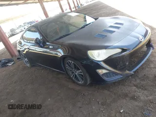 2014 Scion FR-S z VIN JF1ZNAA18E9704218, wystawiony jako IAAI lot #42348298 z przebiegiem 107 122 mil mil oraz . Historia ofert i sprzedaży dostępna na DreamBid. Obrazek 1.