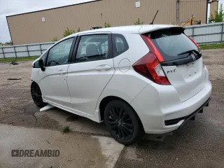 2020 Honda Fit Sport z VIN 3HGGK5H60LM715068, wystawiony jako Copart lot #57706105 z przebiegiem Nie podano mil oraz Nie do naprawy • Non repairable. Historia ofert i sprzedaży dostępna na DreamBid. Obrazek 2.