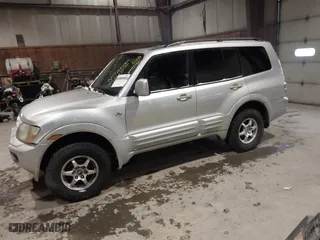 2002 Mitsubishi Montero LTD with VIN JA4MW51R02J016667, listed as a IAAI auction lot 41267504 with 167,446 mi miles. Bid and sale history available at carsss.com. Image 2.